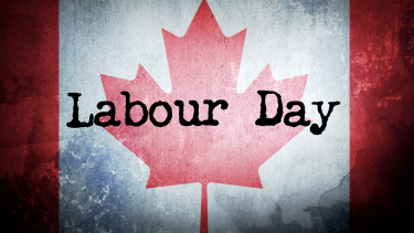 Labour Day A faded Canadian flag with the words, "Labour Day" in black on top of the flag, in an old typewriter font.